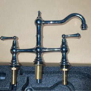 Watermark deck mount bridge faucet with sprayer